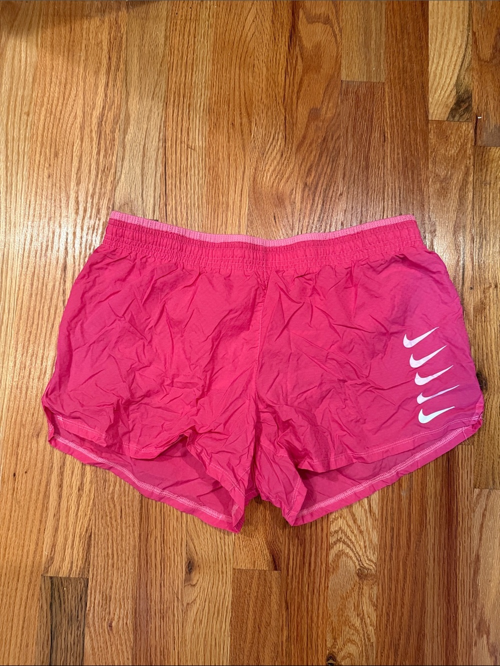 Nike Women’s Hot Pink Athletic Shorts with White Swoosh